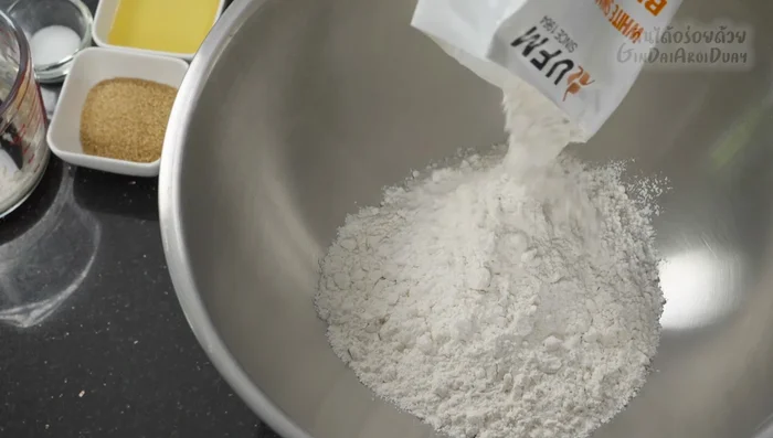 Combine flour, salt, sugar, olive oil, and the yeast mixture in a bowl. Knead the dough for about 5 minutes until smooth and not sticky.