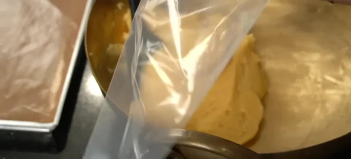 Transfer the dough to a piping bag. Pipe onto a baking sheet, leaving space between each cream puff.