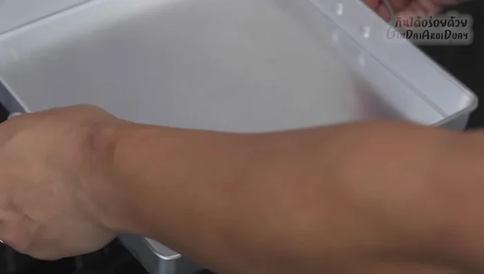 Pour the pandan jelly into a tray. Once slightly set, gently pour the coconut jelly over the top. Let it set completely in the refrigerator for at least 2-3 hours.