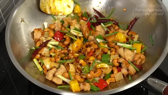 Garnish with spring onions and serve hot.