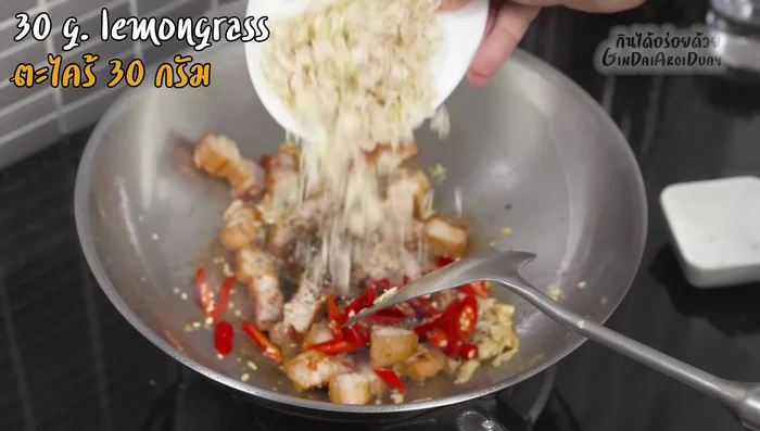 Add the chopped lemongrass and stir-fry until fragrant.