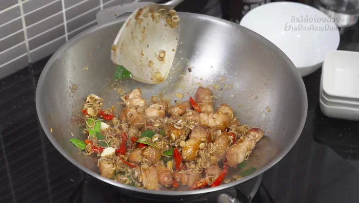 Stir-fry until the pork is cooked and the sauce has thickened. Taste and adjust seasoning as needed.