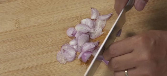 Prepare the fried shallots. Slice shallots thinly. Fry them in a pan over medium-low heat until golden and crispy, adding a pinch of salt for enhanced flavor.