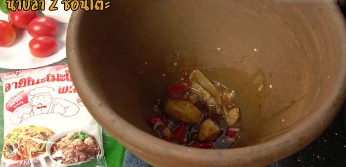 Add tamarind juice, fish sauce, palm sugar, and Ajino Plus (MSG - use half the usual amount). Mix well.
