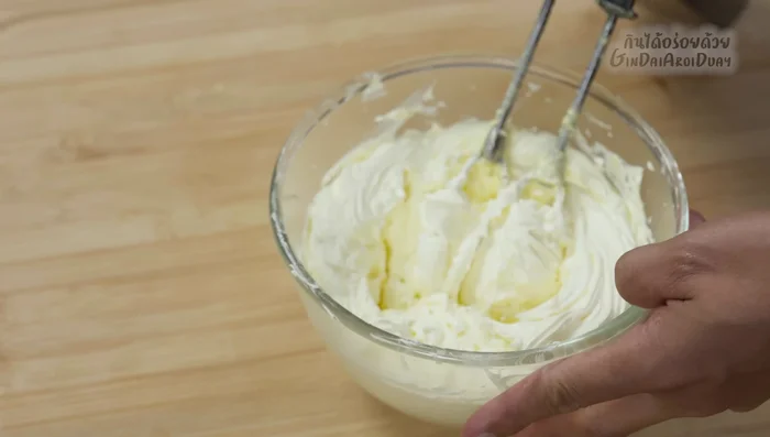 Spread the softened butter evenly onto each bread slice.