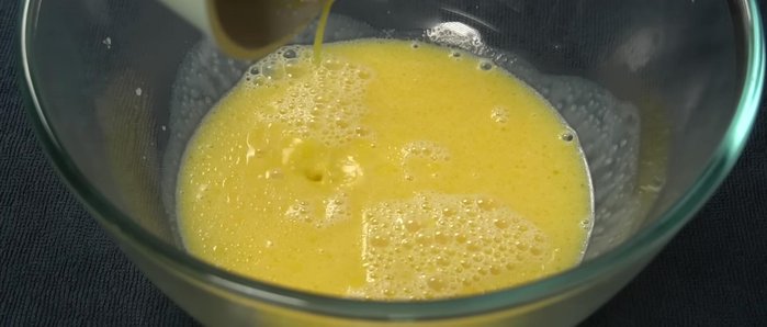 Combine melted butter and milk mixture with egg yolks. Mix well.