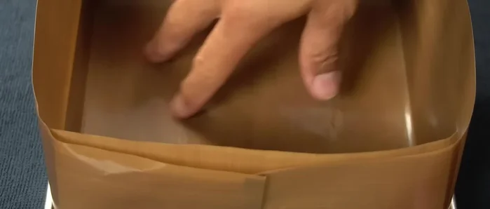 Pour batter into a prepared 8x8 inch square pan lined with parchment paper. Spread evenly.