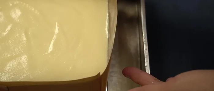 Bake in a preheated oven using a water bath method (place pan in a larger tray with 1cm of hot water). Bake at 150°C (300°F) for about 60 minutes using bottom heat.