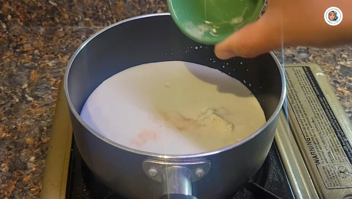 Prepare coconut milk mixture: Combine coconut cream, salt, sugar, and pandan leaves. Simmer over low heat until sugar dissolves and mixture slightly boils.