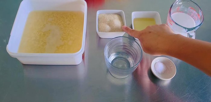 Prepare Bean Paste Filling: Soak mung beans until soft. Steam until cooked (20-30 minutes). Mash or blend the beans. In a pan, combine mashed beans, sugar, salt, water, oil, and coconut milk. Stir over medium-low heat until it forms a lump.