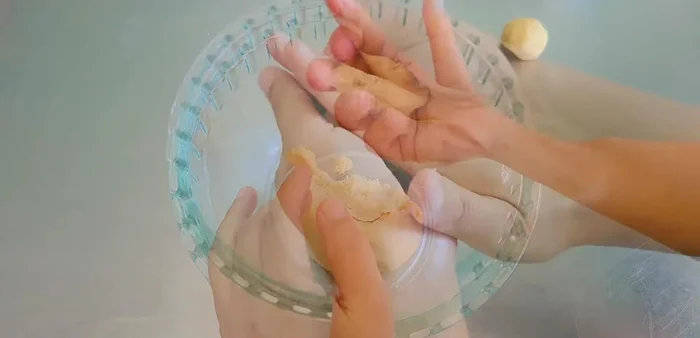 Divide the outer dough into 10 pieces. Shape each into a ball.