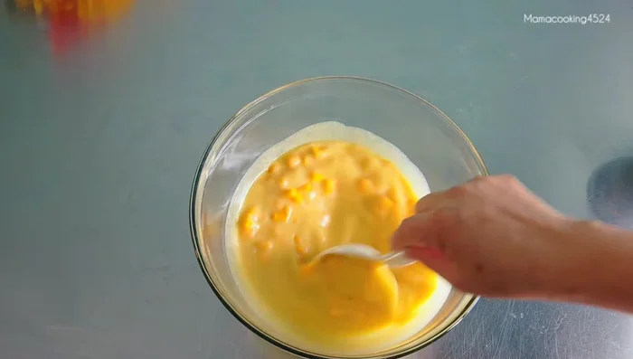 Add the prepared pumpkin pieces to the strained egg mixture.