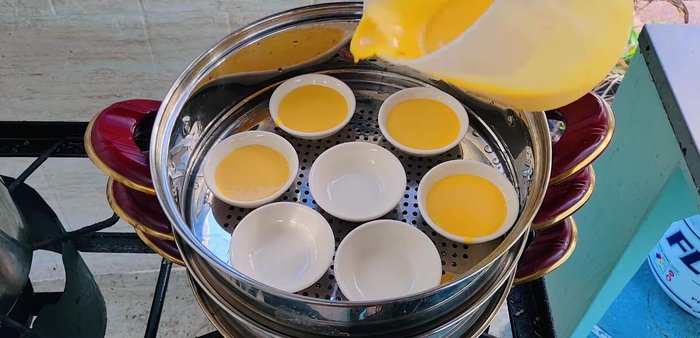 Pour the coconut milk topping over the pumpkin mixture.
