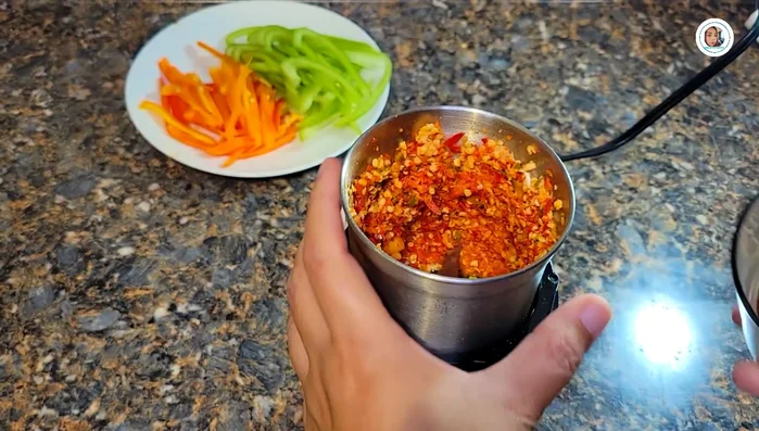 Blend chili and garlic until fine.