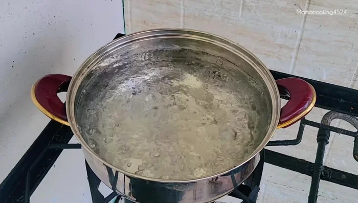 Stew the pork belly and pickled cabbage mixture in boiling water for about 3 hours, adding water if needed.