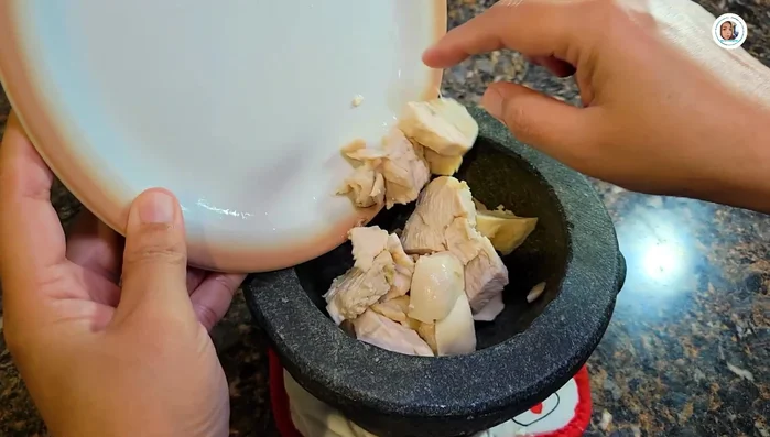 Pound or blend the chicken until fine and fluffy.