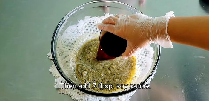 In a container, combine the blended mixture with soy sauce, salt, sugar, seasoning powder, and mix well. (76.119)