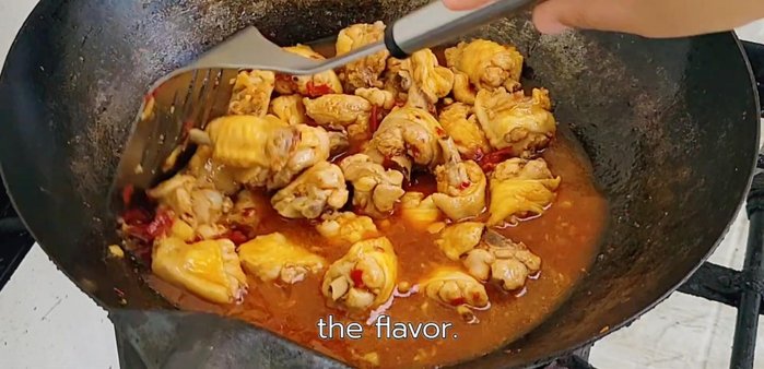 Taste and adjust seasoning as needed. Continue to simmer until the water has reduced and the chicken is tender.