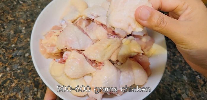 Cut the chicken wings into smaller pieces.
