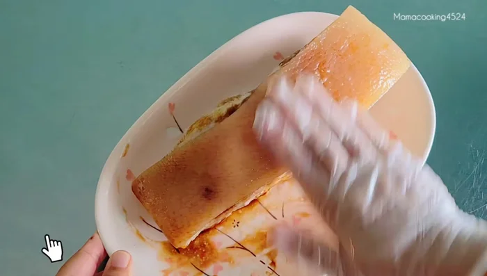 Pan-fry the pork belly (skin side down) until the skin tightens and changes color. No need to add oil.