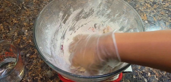 Gradually add water to the chicken mixture until you get a thin, well-mixed batter. (85.24)