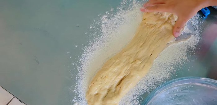 Roll out the dough into a long log and cut into equal sized pieces.