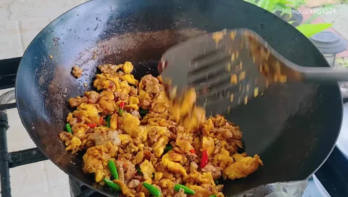 Stir-fry for about 1 minute. Add onion.
