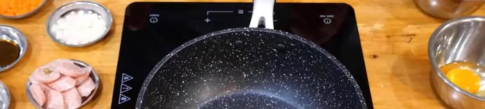 Open the pan and heat it up. Turn on the power at about 1600 watts. Add oil.