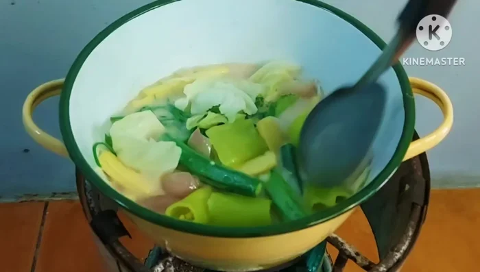 Simmer until vegetables are cooked through. Taste and adjust seasoning as needed.