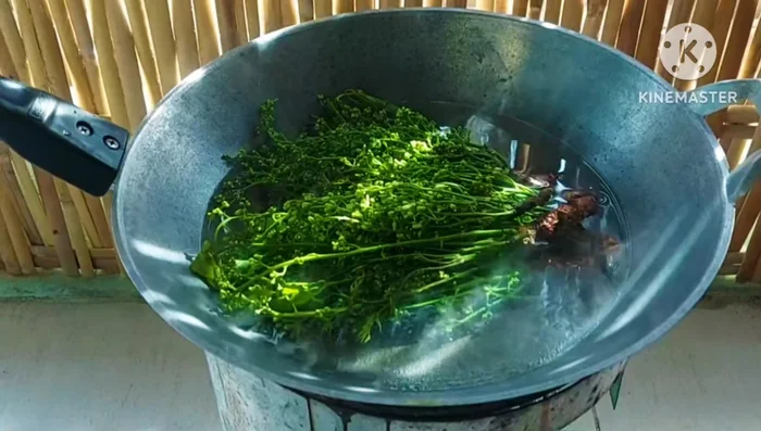 Bring water to a boil, add salt. Add the bitter melon and boil or blanch. Don't boil for too long if you don't want it too bitter.