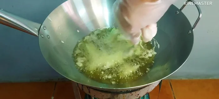 Heat oil and fry vegetables in batches until golden brown and crispy.