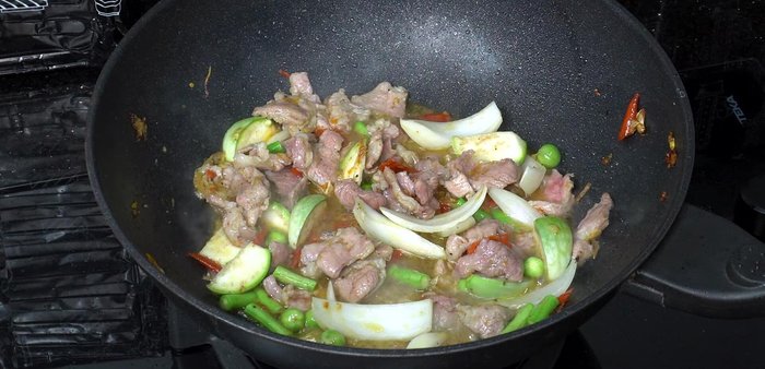 Season with fish sauce and oyster sauce. Stir-fry until well mixed.