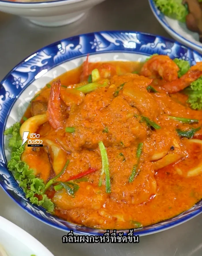 Serve hot, garnished with any desired vegetables or herbs. Enjoy your homemade Khao Tom Pla!