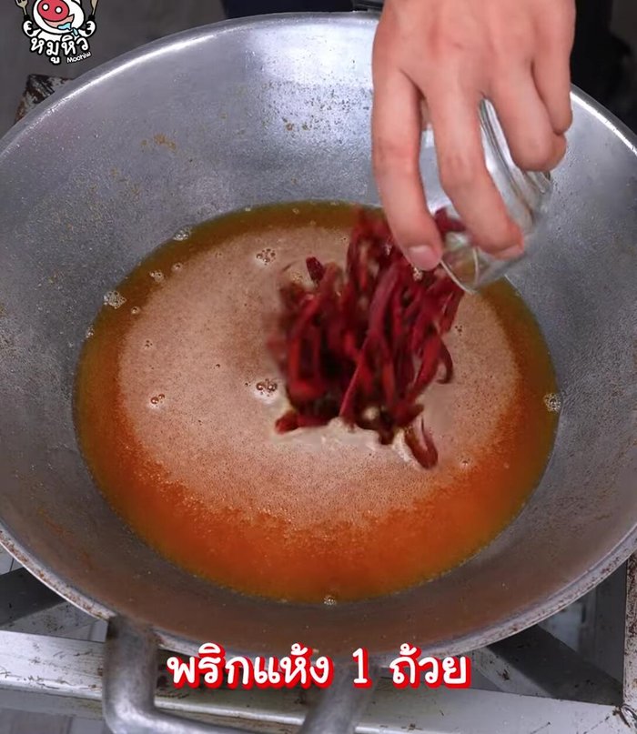 Fry dried chilies until slightly cooked.