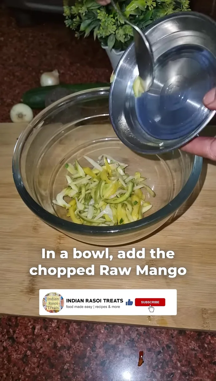 In a large bowl, combine the chopped raw mango, onion, cucumber, beetroot, boiled corn, and roasted peanuts.
