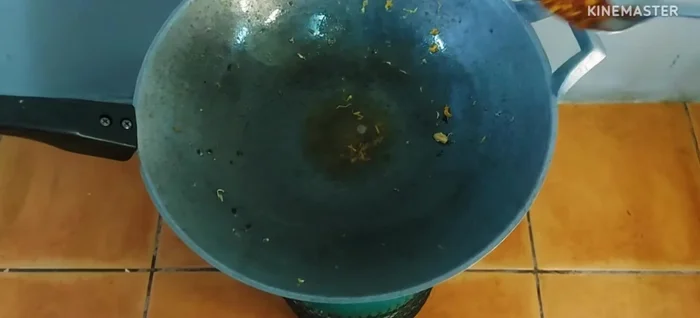 In the same pan, reduce heat to low. Add the chili paste and stir-fry with the remaining oil until fragrant.