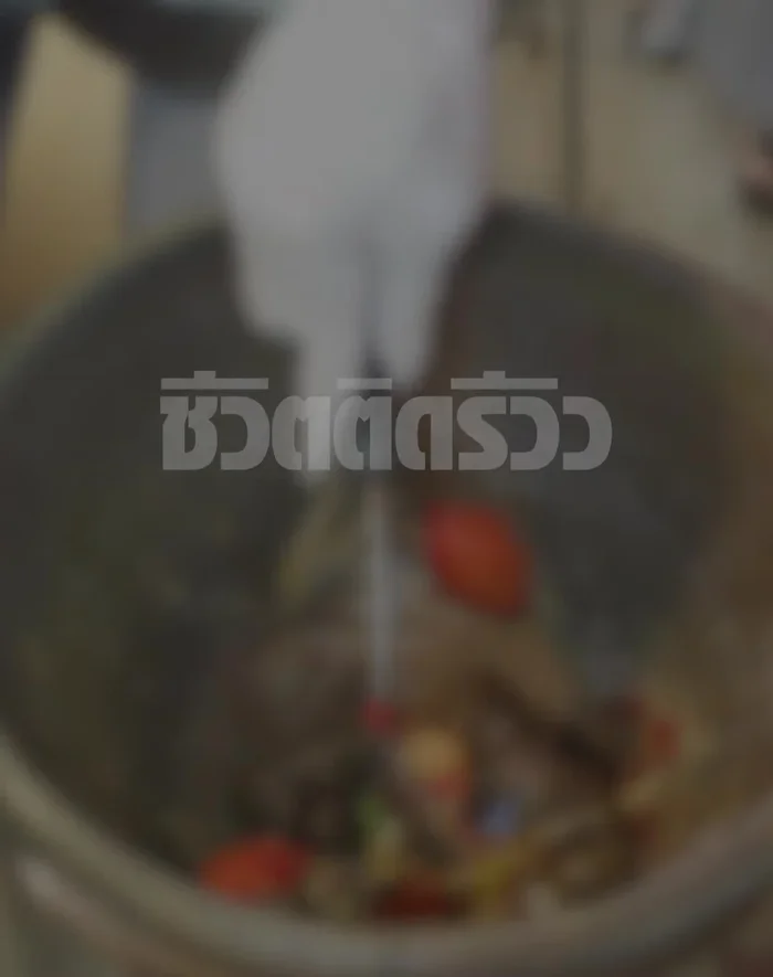 In a mortar and pestle, pound the chilies, garlic, and dried shrimp until finely ground.