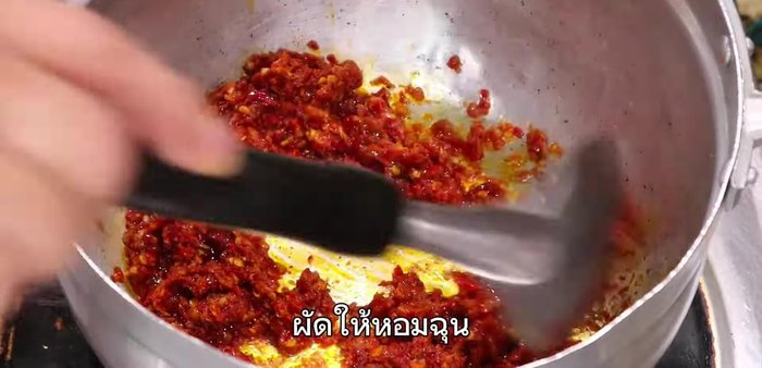 Simmer until the curry paste is fragrant and slightly thickened.