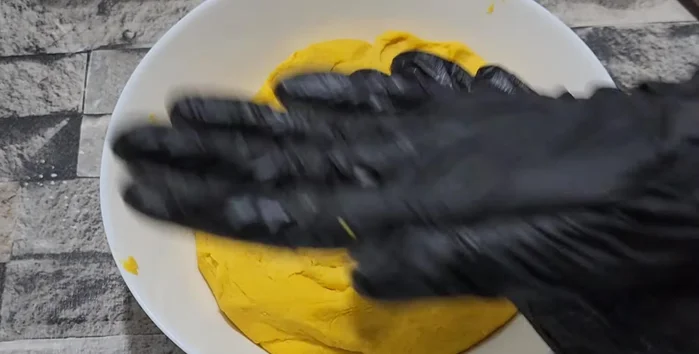 Roll the dough into small balls.