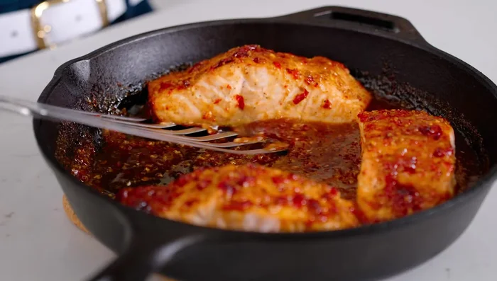 After broiling, remove salmon. Add 1/4 cup of water to the skillet and simmer until sauce thickens.