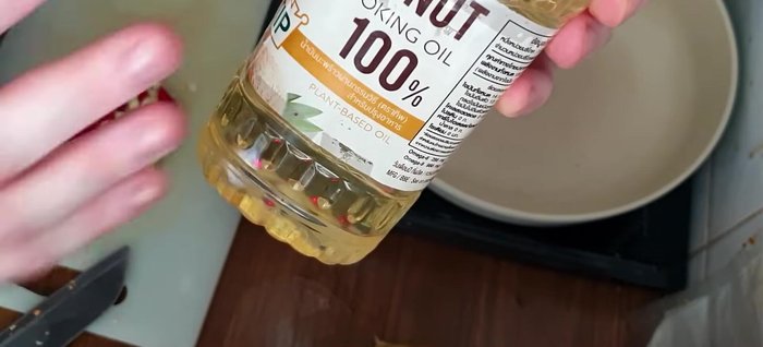 Heat coconut oil in a frying pan.