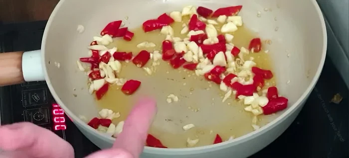 Add minced pork and stir-fry until browned, allowing some caramelization for better flavor.