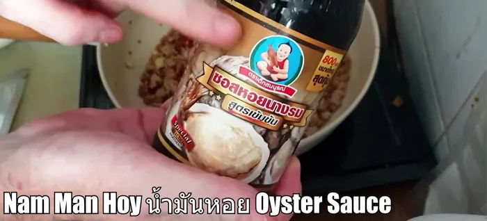 Add fish sauce, oyster sauce, and sweetener (to taste) to the pork mixture.