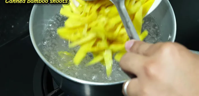 Boil canned bamboo shoots for 5-10 minutes.