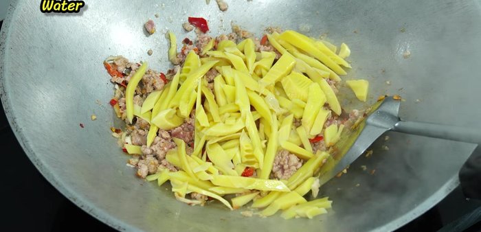 Add bamboo shoots, oyster sauce, sugar, fish sauce, and black pepper.