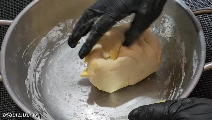 First rest: Let the dough rest for a while, covered with a damp cloth.