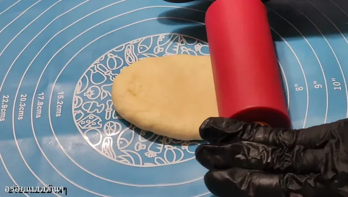 Shape the dough: Roll each dough piece into a thin, long sheet.