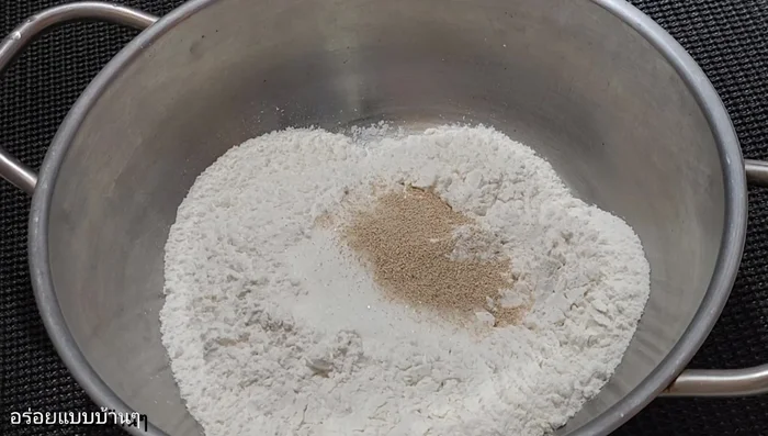 Mix the flour mixture: Combine all-purpose or bread flour, sugar, salt, yeast, eggs, and fresh milk.