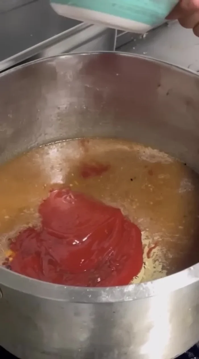 Mix all ingredients together: tamarind juice, jaggery, sugar, white pepper powder, chili flakes, and the tomato sauce mixture.