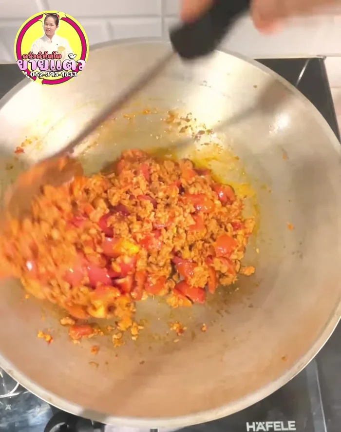 Stir-fry for 2-3 minutes. Season to taste with palm sugar and tamarind juice.